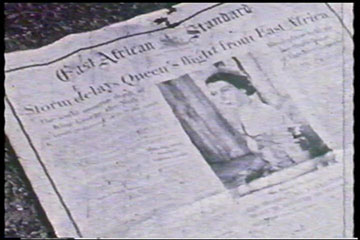 The East African Standard newspaper: a photograph of Queen Elizabeth II under the headline 'Storm delays Queen's flight from East Africa'.